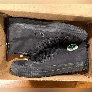 High top all black PF Flyers, size 11. Used